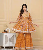 Rayon embroidered Anarkali Kurti set with Sharara and dupatta, solid pattern, three-quarter sleeves, India-made women's fashion on display