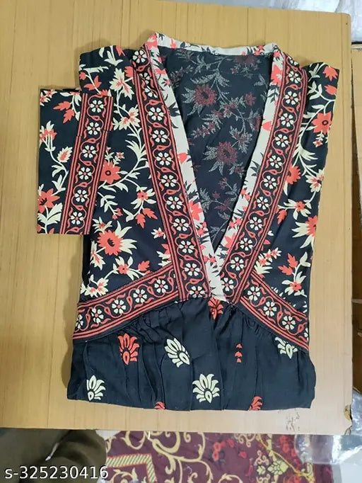 Rayon three-quarter sleeve printed Anarkali kurti, trendy ethnic wear gown for women. Vibrant Indian print on soft rayon fabric