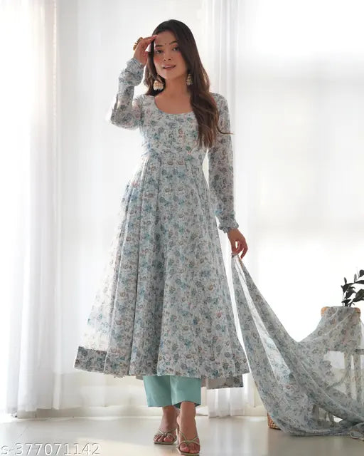 Pure orange chiffon floral print Anarkali with dupatta set, perfect for summer weddings. Long-sleeved, fully flared design with padded churidar sleeves and micro cotton lining." (123 characters)