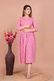 Pink cotton Anarkali maternity kurti, three-quarter sleeves, printed combo. Maternity clothing for housewives and office-going women with side zip, soft fabric. Made in India." (124 characters)