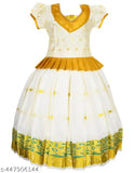 Elegant white cotton lehenga choli set with gold zari work for kids, traditional Kerala pavada style with green floral motifs, perfect for festivals