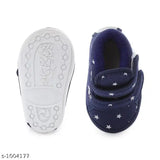 Multi-colored canvas and PVC baby booties with velcro fastening, trendy design on net pattern, suitable for sizes 6 months to 2.5 years (India origin)
