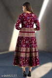 Maroon printed rayon Anarkali gown with three-quarter sleeves, perfect for women's casual or regular wear. Made in India