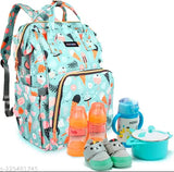 Light green Unicon print diaper backpack for mothers, spacious waterproof with multiple pockets for baby essentials organization. Features 3-layered protection, 13 pockets, insulated milk bottle pockets, anti-theft pocket, key chain clip, and adjustable straps. New style based on trending prints. Hand wipe clean, free size. Made in India
