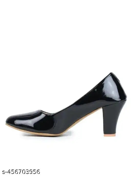 Black leather heels with buckle detail - Stylish partywear pumps, featuring multiple heel styles including block, cone, spool, comma, pencil, slim, comfort, and kitten heels. Available in sizes IND-3 to IND-8. Made in India