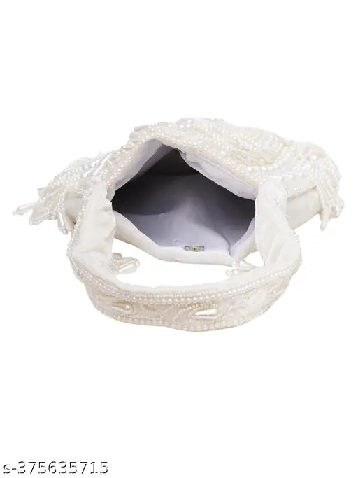 Off white hand-embroidered fabric clutch purse, intricately embellished with net pattern and gold accents, perfect for special occasions. Handcrafted in India