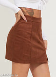 Faux suede rust velvet short skirt with 3.5" side slit, perfect for casual events or parties. Available in sizes 26, 28, 30, and 32. Made in India