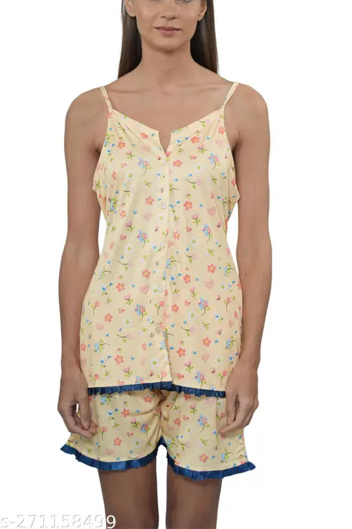 Women's yellow poly silk shorts set with spaghetti top, printed net pattern, sleeveless, available in sizes S-XXXXL. Soft and breathable Indian nightwear for ultimate comfort on sensitive skin