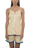 Women's yellow poly silk shorts set with spaghetti top, printed net pattern, sleeveless, available in sizes S-XXXXL. Soft and breathable Indian nightwear for ultimate comfort on sensitive skin
