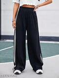 Trendy printed cotton-lycra joggers for women, featuring side stripes and pockets. Soft fabric, available in sizes 28-34 inches
