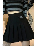 Cotton solids solid-color pleated mini skirt for women and girls, high waist tennis skater style from Caracola