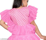 Stitched net kids gown by Gulnaz Fashion, solid color, short sleeves. Perfect for parties and festivals like Raksha Bandhan, Navratri, Diwali, Christmas, New Year. Dry clean only, size 4-16 years. Elegant style tip: wear with statement earrings & high heels. Made in India