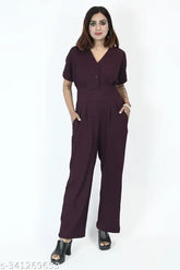 Wine red stretchable jumpsuit, premium quality and soft fabric for women's plus sizes. Solid design, party-ready with button closure and two pockets