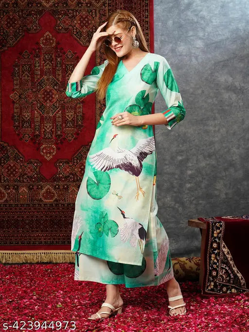 Green cotton blend printed straight kurta with palazzos, three-quarter sleeves, and matching pants for women - Indian traditional wear
