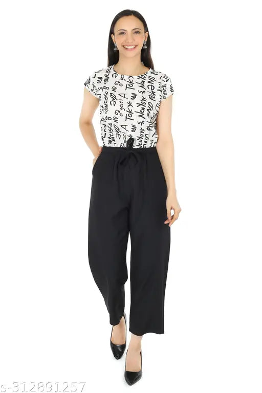White polka dot crepe top with black crepe bottom, Tokyo Chic design, short sleeves, available in multiple sizes