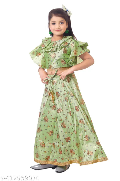 Girls printed lehenga choli set in art silk, short sleeves with applique net pattern. Traditional Indian clothing for 5-6 or 6-7 year old girls from India