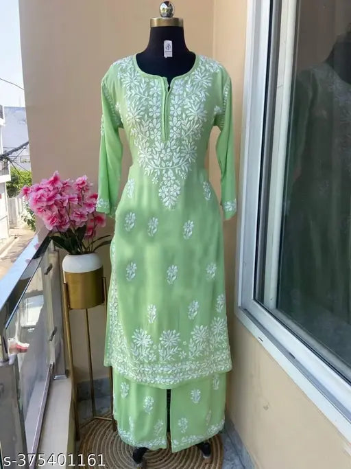 Premium rayon Chikankari embroidered kurti and palazzo set, three-quarter sleeves, Indian traditional fashion on mannequin