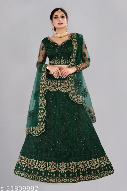 Green silk and net lehenga with embellished dupatta, showcasing heavy embroidery and stonework. Semi-stitched (waist size 44 in, length 42 in, dupatta length 2.25 in), featuring a heavy net choli with silk inner fabric. Origin: India (Lehenga length 46 in, Choli size 0.80 mtr, Dupatta length 2.4 mtr)