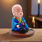 Solar-powered blue round base Gautam Buddha statue, hand sitting design for home/office decor, symbolizing wealth & prosperity