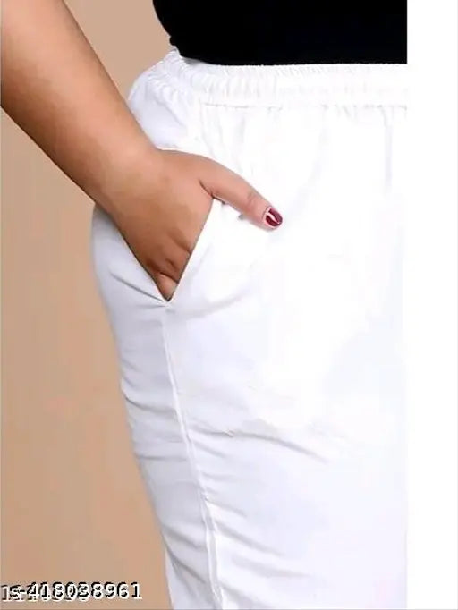 White plus size solid highrise cotton lycra jumbo pant with stretchable fit, side pocket, and wide elastic waistband