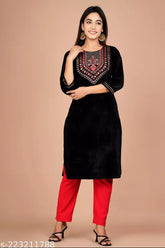 Black velvet kurta with embroidered yoke design, three-quarter sleeves - women's winter wear from India