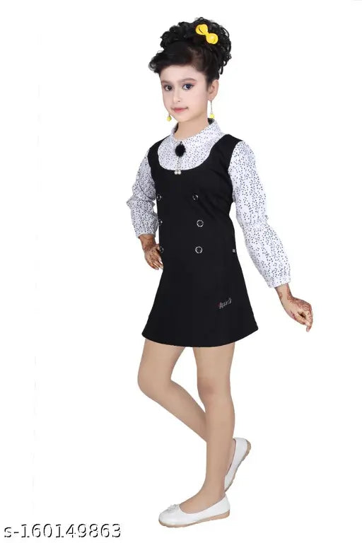 Cotton blend western dress for kids girls, self-design net pattern with long sleeves. Above knee length pinafore dress in straight hem, comfortable for parties or festivals. Made in India