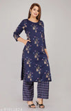 Rayon printed kurta palazzo set for women, three-quarter sleeves rayon outfit on model, Indian ethnic fashion for ladies