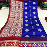 Royal blue Sambalpuri silk saree with floral buta allover pattern, ideal for Odisha pujas and traditional celebrations