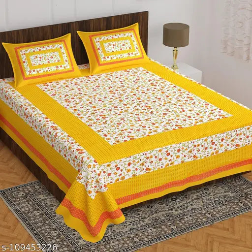 Fine cotton floral bedsheet & pillow cover set, vibrant yellow screen print, ideal for summer adults
