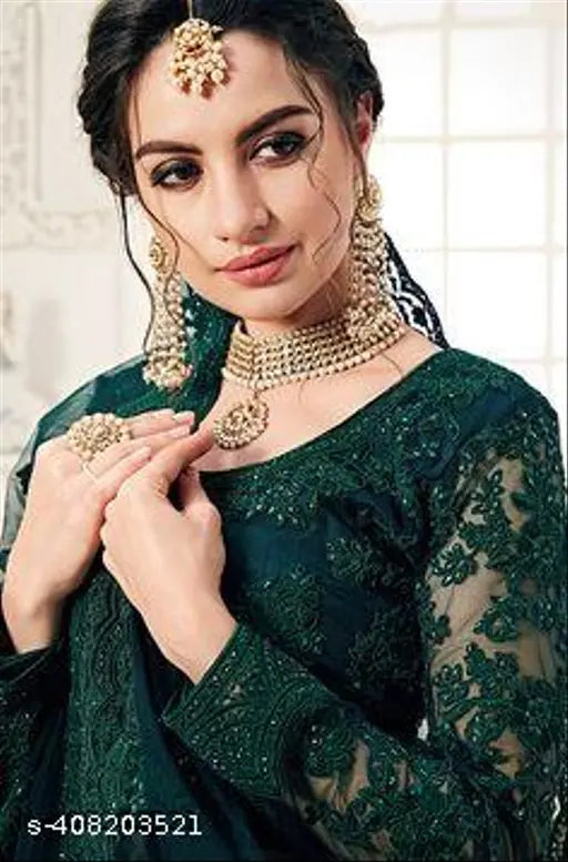 Heavy embroidered bridal Lehenga Choli set with Blouse on display, features intricate net fabric and rich embellishments for girls & women, Indian ethnic wear