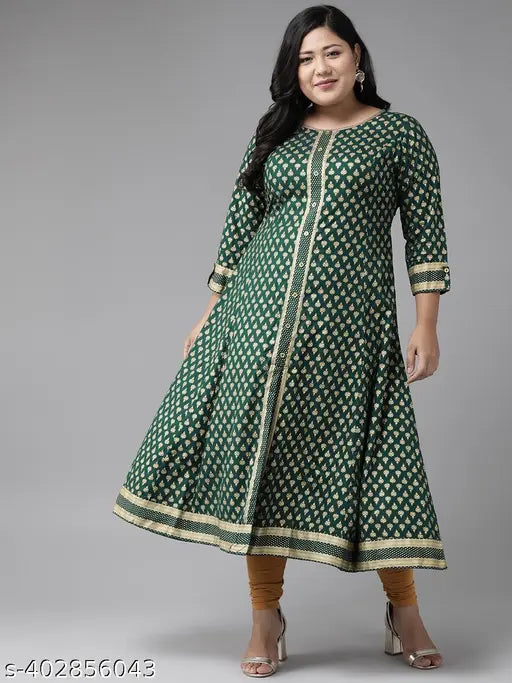 Green rayon ethnic motif round kurti, Yash Gallery. Golden floral print A-line design, 3/4 sleeves, Indian fashion