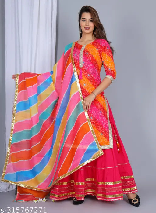 Rayon kurta skirt set with dupatta and cotton bottomwear, printed in vibrant Indian patterns, perfect for women and girls. Three-quarter sleeves stitched net, wash like colors. Sizes available from S to XXXL