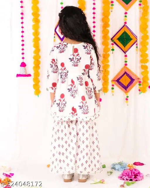 White floral cotton kurti-sharara set with gota detailing, three-quarter sleeves. Traditional ethnic look for kids aged 6 months to 9 years. India origin