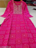 Rayon pink kurti with yoke, embroidered Bandhej thread work - stylish wear for festivals and office (109 characters)