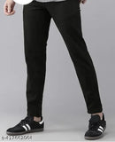 Trendy men's cotton mid-rise black jeans, slim fit and dyed/washed for a modern look. Style with a comfortable waist size of 28, 30, or 32 inches. Made in India