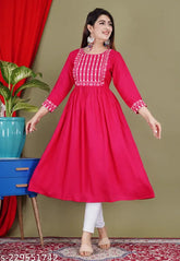 Embroidered rayon kurti, three-quarter sleeves, Indian embroidery clothing on hanger