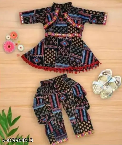 Printed black cotton blend dhoti pants and kurta set for girls, traditional Indian outfit in chic A-line style with short sleeves and knee length top