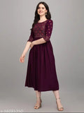 Rayon embroidered laxmi wine kurtis, three-quarter sleeve, S to XXL sizes on display rack