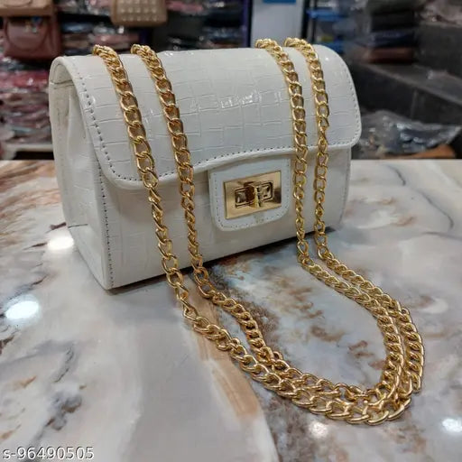 Textured net croc-effect danda sling bag with heavy chain, perfect for women and girls. Crossbody style, free size (8in x 6in x 5in)