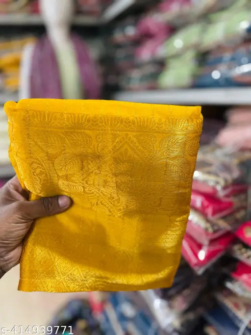 Yellow organza Lehenga Choli set for girls, featuring floral designs and zari woven dupatta. Perfect for festive occasions in India." (124 characters)