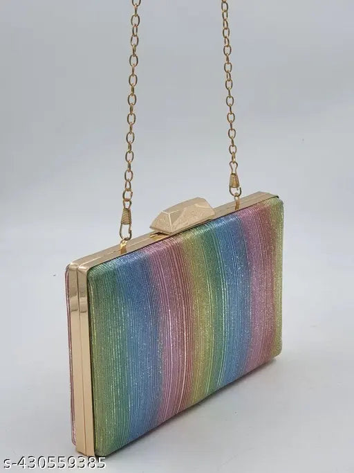 Silver multi-color PU leather vintage wallet/clutch, embellished with glittering material. Slim ladies purse featuring secure push lock and sling chain. Free size (22x12x4 in), perfect for parties or bridal events. Handcrafted in India