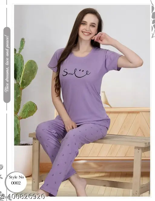 Purple hosiery cotton printed half sleeve T-shirt and pajama pants nightsuit set for ladies, featuring short sleeves and printed pattern. Single piece available in sizes M, L, XL, XXL, originating from India