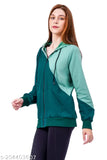 Green color blocked cotton terry hoodie with adjustable drawstring, long sleeves, and kangaroo pockets for a casual look. Made in India