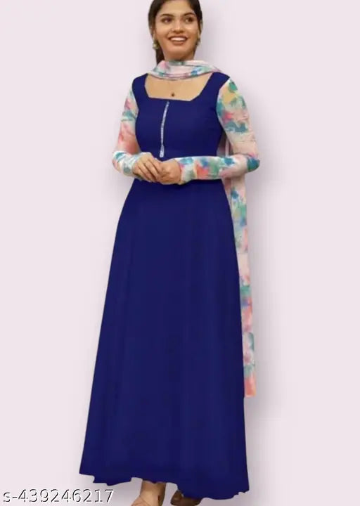 Blue Georgette gown9 with long sleeves, featuring a solid design. Comes in sizes S, L, XL, XXL from S.V. Fashions. Pastel-shaded dress and dupatta set, boasting a refreshing print and full sleeves for a western look. Made in India