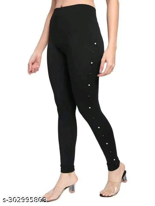 Black cotton jeggings for women & girls, solid with side stones, stylish fit, free size, soft feel, elastic waistband, versatile for casual or Indian outfits