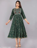 Gold-printed rayon anarkali kurti with sequin embroidery, three-quarter sleeves, suitable for M (38in bust, 48in length), L (40in bust, 48in length), XXL, 4XL. Indian traditional women's fashion