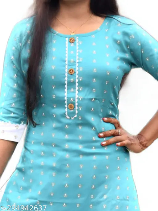 Embellished cotton blend kurta sets for girls, trendy straight top and skirt set in knee length, without dupatta. Nandini set available in sizes 7-8 Years to 13-14 Years. Indian made clothing