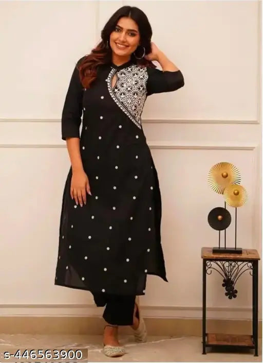 Rayon embroidery work kurta with palazzos, printed net, three-quarter sleeves set on display