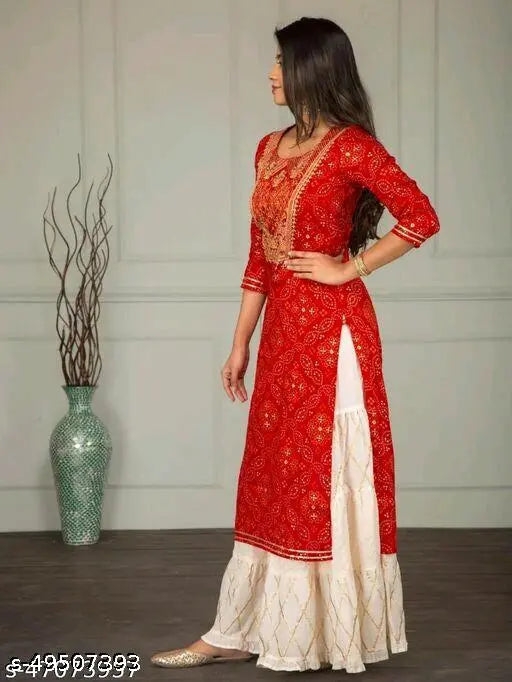 Red Jaipuri sharar set with gotta work kurta and three-quarter sleeves, rayon fabric, printed net pattern, Indian origin