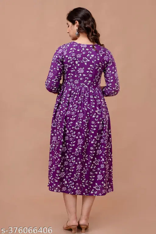 Purple printed anarkali kurta for women in rayon-cotton blend, 3/4 sleeve length, suitable for daily, party, casual, and office wear. Perfect fit for sizes S to XXXL